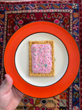 Pink Breakfast Pastry on Plate